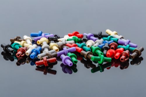 Color coded orifice restrictors for flow control. The color indicated the orifice size